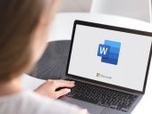 Notebook with Microsoft Word logo. Word processor developed by Microsoft.